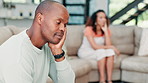 Frustrated couple, divorce and fight on sofa in disagreement, argument or breakup in living room at home. Angry man and woman ignore in toxic relationship, cheating affair or drama from conflict