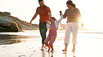 Beach, walking and family holding hands, holiday and happiness with weekend break and travel. Parents, mother and father with summer and seaside with vacation, girl and ocean with child and playing