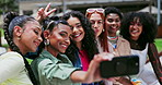 Friends, women and selfie outdoor, influencer group and memory in the city for social media post. Young, happy in picture for content creation and peace sign with gen z, photography and diversity