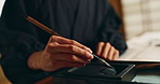 Hands, reed pen or brush in ink for writing, calligraphy or ancient script for art and inkstone. Japanese creativity, black paint and vintage tools, paintbrush and stroke, traditional and stationery