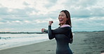 Surfer woman, stretching and happy at beach, smile and ready for workout, training or wellness in morning. Person, athlete and excited by ocean, waves and nature for health, muscle or arms in Japan