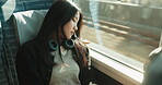 Train, commute and woman on journey sleeping on transportation in Japan with headphones. Tired, fatigue and girl travel on metro in city with audio technology, infrastructure or relax on the bus