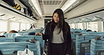 Japanese woman, train and seat for travel, transportation and walk in aisle to search for booking. Girl, student person and railway passenger with locomotive for commute to university in Tokyo 