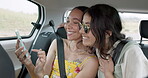 Couple of friends, mobile and car for road trip information, location search and social media. Happy women scroll on phone or app talking of travel, holiday and transportation service with funny chat