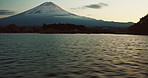 Aerial drone, water and mountain of ocean, sky and clouds in outdoor natural scenery of Japan. Ripples, tide and eco friendly environment of nature, lake or view of greenery in countryside on mockup