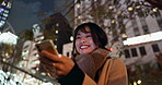 Happy asian woman, phone and night on social media, communication or outdoor networking. Female person smile in late evening on mobile smartphone for online chatting, reading or texting in urban town