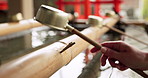 Shinto shrine, hands and fountain with water in container for faith, clean or washing for wellness. Religion, culture and praise with ladle for purification ritual in woods, peace or temple in Kyoto