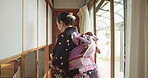 Woman, japan and tea ceremony tradition in tatami room for healing ritual, harmony or calm environment. Female person, kimono dress and hot rink for self connection, religious experience or health