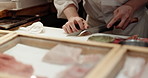 Cooking, hands and chef knife in a restaurant with catering, fish chop and Japanese dish in kitchen. Menu, culinary artist and fine dining with sushi and person with food and sashimi for dinner