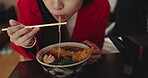 Woman, ramen and eating food in restaurant for nutrition, healthy meal and closeup with chopsticks. Person, Japanese cuisine and noodles for lunch or dinner in cafeteria with vegetable and hungry