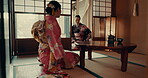 Women, tea ceremony and Japanese cultural tradition in tatami room for calm health, religious practice or healing. Female people, lesson and teaching drink ritual in kimono, indigenous or experience