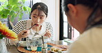Japanese woman in restaurant, eating ramen and food for lunch or dinner. Noodles, bowl and a young hungry person, customer and friends with chopsticks to enjoy healthy meal or traditional cuisine