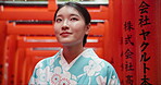 Woman, Japan and kimono or traditional culture at Fushimi Inari, shrine in Kyoto. Female person, temple clothes and path to worship building for spiritual outdoor journey, local tourism or heritage