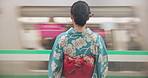Japanese woman, back and train station to travel in fast bullet and traditional clothes on platform. Person, subway and kimono fashion in tokyo city and waiting on metro transport with motion blur