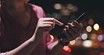 Woman, hands and phone in city at night to update social media, download digital app and scroll mobile notification. Closeup, outdoor and typing on smartphone, search online news and chat to contact 