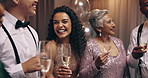 Friends, champagne and conversation at new year party, celebration and laugh with wish for success. Men, women and diversity with glasses, drink and alcohol for cheers, happy or excited at gala event