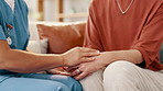 Woman, nurse and holding hands in elderly care, support or trust for healthcare, advice or comfort at home. Closeup of female person, doctor or caregiver touching patient for loss, grief or empathy