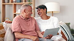 Senior couple, tablet and laugh or relaxing at home, humor and bonding in living room. Elderly people, streaming service and funny blog or meme on internet, comedy and happy for movie or series