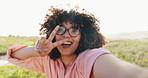 Face, woman selfie and peace sign for social media post in nature, emoji and happy on vacation. Female person, live streaming and internet connection for holiday update, blow kiss and portrait