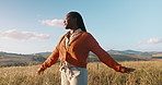 Happy, field and black woman with peace, sunshine and vacation with nature, fresh air and journey. African person, outdoor and girl with happiness, adventure and summer break with health or breathing