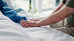 Patient, person and hand holding on hospital bed for empathy or support for health problem, diagnosis or virus. People, fingers and embrace for difficult news or marriage compassion, unity or love