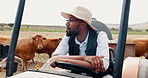 Farming, tractor and black man in cattle field, sustainability and agriculture in countryside. Nature, animals and cow farmer thinking in truck, small business in food or dairy production in Africa.