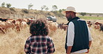 Farming, woman and man with cattle, conversation on sustainability and agriculture in field. Nature, animals and cow farmer couple with small business, discussion and walking in African countryside.