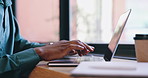 Cafe, hands and man with a laptop, typing and connection with internet, closeup or email notification. Person, copywriter or freelancer with computer, coffee shop or startup research with remote work