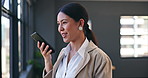 Phone, voice recognition and business woman in office by window for mobile communication. Smile, technology and professional female person recording message or on call with cellphone in workplace.
