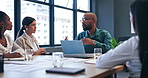 Businessman, leader and laptop in meeting with staff for presentation, training or coaching at office. Male person, manager and team in discussion or listening to project coordinator at workplace