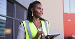 Engineering woman, thinking and planning on tablet at construction site, building development and architecture. African contractor, builder or designer typing on digital technology for inspection