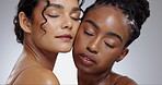 Women, beauty and skincare with diversity in studio with facial treatment, happiness or glowing skin. Friends, model and face with relax for cosmetics, dermatology or body care on gray background
