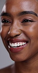 Black woman, teeth and closeup for dental hygiene, skincare or cosmetics on a gray studio background. Face of African female person, mouth or smile for tooth whitening or oral and gum care treatment