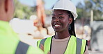Face, smile and black woman engineer talking to colleague on building site for planning. Industry, project management and architecture with happy young construction worker speaking to coworker