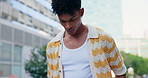 Fashion, serious and face of man in city with trendy clothes, modern style and cool outfit in street. Weekend, travel and portrait of person with pride, confidence and accessories in urban town