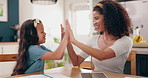 Mother, child and high five for education in home with success, support or achievement at dining table. Family, girl and parent with happiness and celebration for academic victory, or learning growth