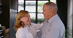 Home, dancing and senior couple with love, smile and celebration for anniversary, happiness and relationship. Apartment, old man and mature woman with joy, marriage and trust with peace and romance
