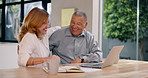 Home, laptop and senior couple with hug, smile and connection with planning, retirement fund and notebook. Apartment, old man and mature woman with computer, embrace and website information with joy
