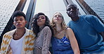 Urban fashion, portrait and gen z friends with confidence, solidarity and diversity with streetwear from below. City culture, young men and women on street with serious social, cool style and relax.