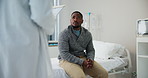 Doctor, hospital bed and documents for sick black man worried during consultation for results, exam or health scare. Healthcare, paperwork or African male patient with nurse for insurance problem