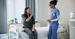 Doctor, patient and woman in a consultation, healthcare and conversation with nurse and healthcare. Professional, appointment and medical with discussion and treatment with diagnosis and checklist