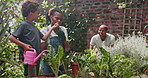Child, family gardening and learning of plants, watering and growth for sustainability, nature and care in backyard. African mother, father and kid with herbs for eco friendly harvesting and helping