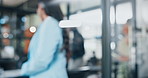 Blur, business people and walking to meeting, team planning or discussion in startup office. Group, professional or collaboration of creative designers in cooperation, brainstorming strategy or bokeh