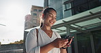 Phone, smile and wind with businesswoman in city, walking on street or sidewalk for morning work commute. Contact, mobile or social media with happy young employee in urban town for travel journey
