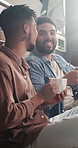 Smile, drinking coffee and gay couple in home, talking and bonding in the morning at breakfast in kitchen. Lgbtq, tea and men in conversation together, relax and connection for love in relationship