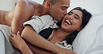 Happy couple, hug in bed and love with intimacy and romance at home for relationship, sex and bonding. Young people, woman and man relax in bedroom, cuddle and laughing with kiss and talking together