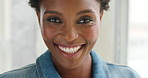 Happy young african american woman laughing