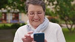 Phone, backyard and senior woman on social media in nature garden enjoying scrolling the internet alone. Happiness, happy and elderly person smiling browsing a fun social network website outdoors