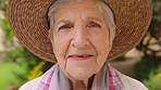 Senior woman face, happy portrait and gardening in environment, summer field and backyard in retirement home outdoors. Zoom on elderly, old and smile farmer, relax in eco friendly and calm nature
