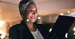 Business woman, manager and tablet at night in office to search online report, scroll information and website planning. Happy mature entrepreneur working late on digital data with social network app